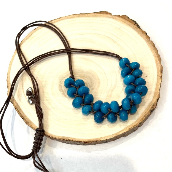 Teal beaded necklace on brown cord, made by Fossil - Picture 1 of 6